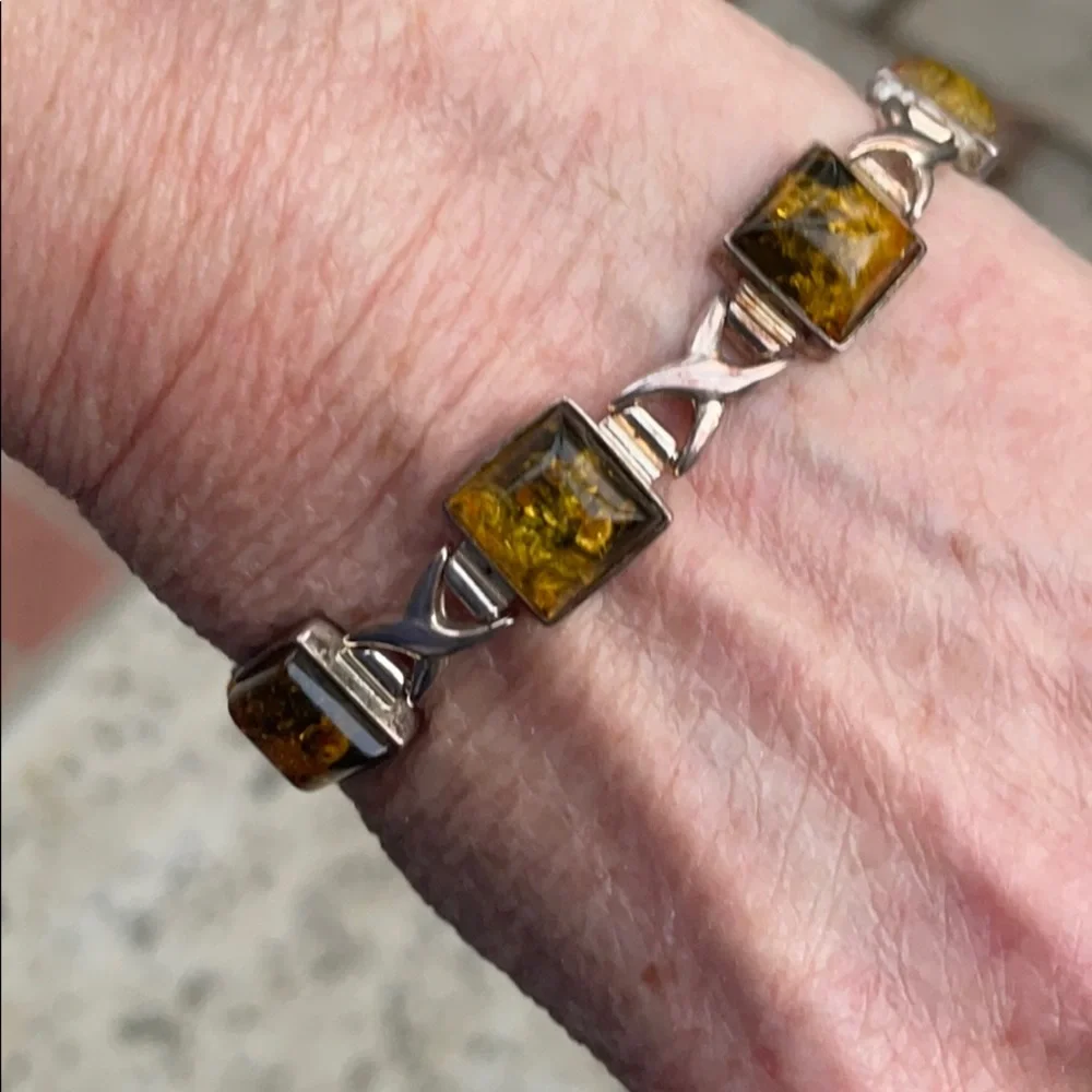 Antique sterling silver bracelet with green amber